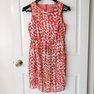 Cute sleveless, rosy-salmon colored printed dress